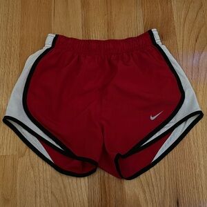 Red Nike shorts